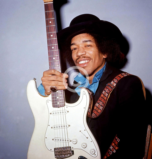 Jimi Hendrix Candid And Smiling With Guitar