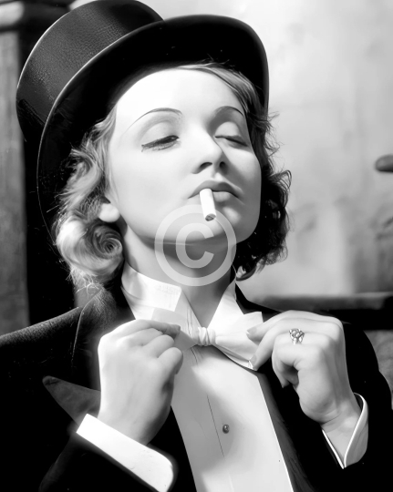 Marlene Dietrich 1930s adjusting her bow tie