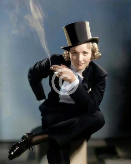 Marlene Dietrich smoking in a tuxedo c. 1930