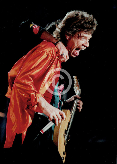 Mick Jagger Singing And Smiling