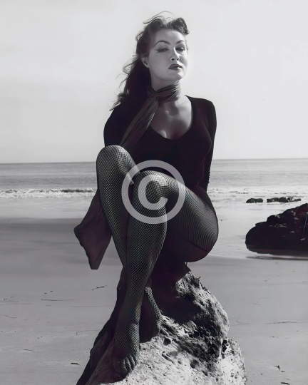 Julie Newmar on the beach c. 1959