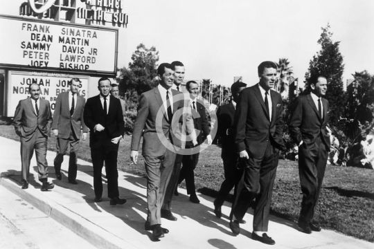 The Rat Pack Walking In Front Of The Sands Motel Sign